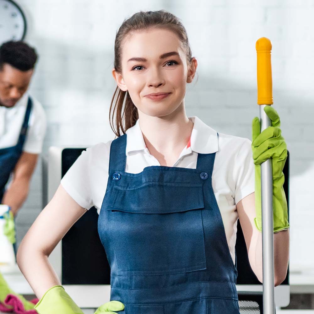 panoramic-shot-of-smiling-cleaner-standing-with-ha3-TFFCR6Q.jpg